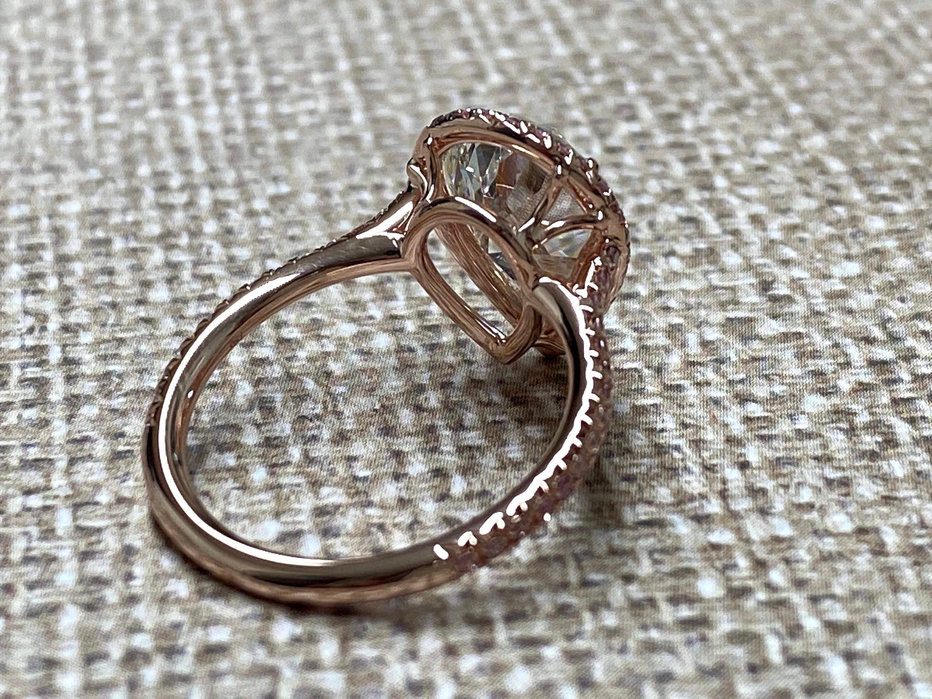 Rose Gold pearshape diamond center ring