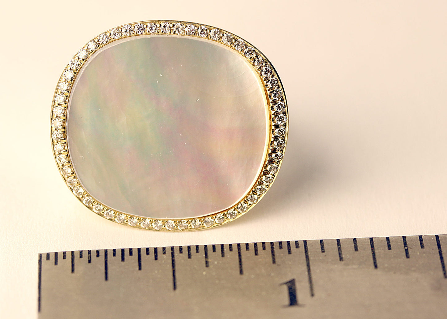 Yellow gold mother of pearl ring with 0.30ct tw diamonds, art deco