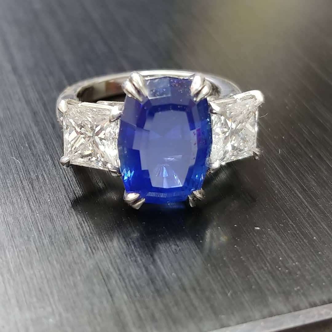 Platinum handmade ring, Cushion sapphire center with princess diamonds