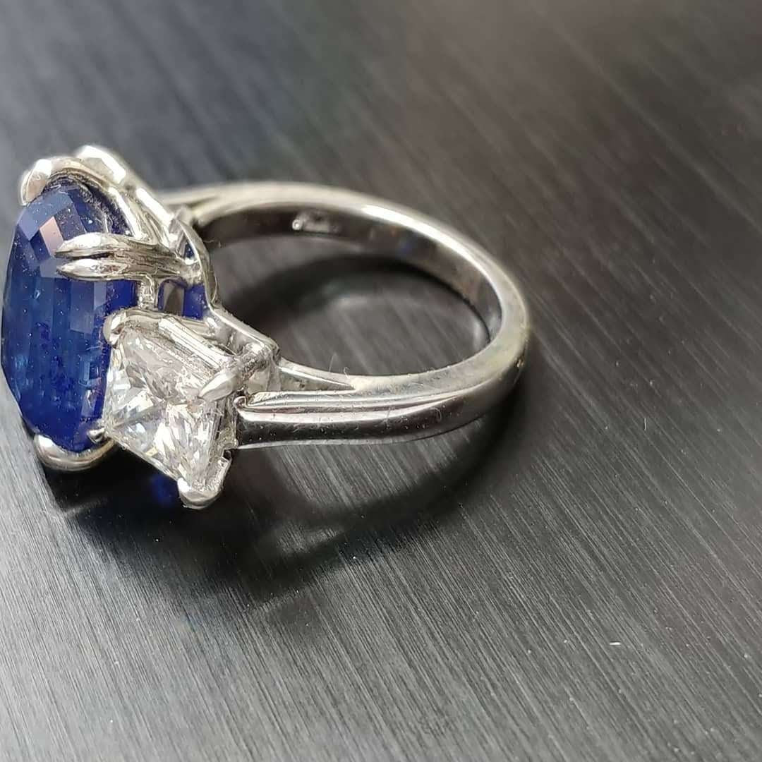 Platinum handmade ring, Cushion sapphire center with princess diamonds