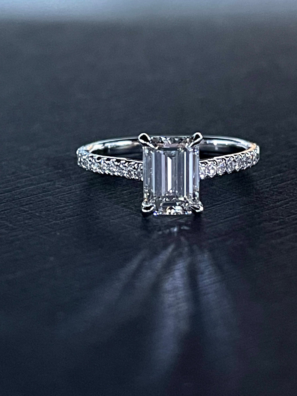 18K white gold emerald cut center diamond ring