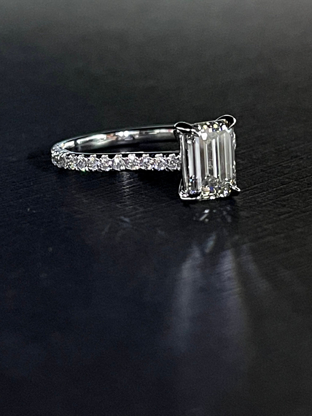 18K white gold emerald cut center diamond ring
