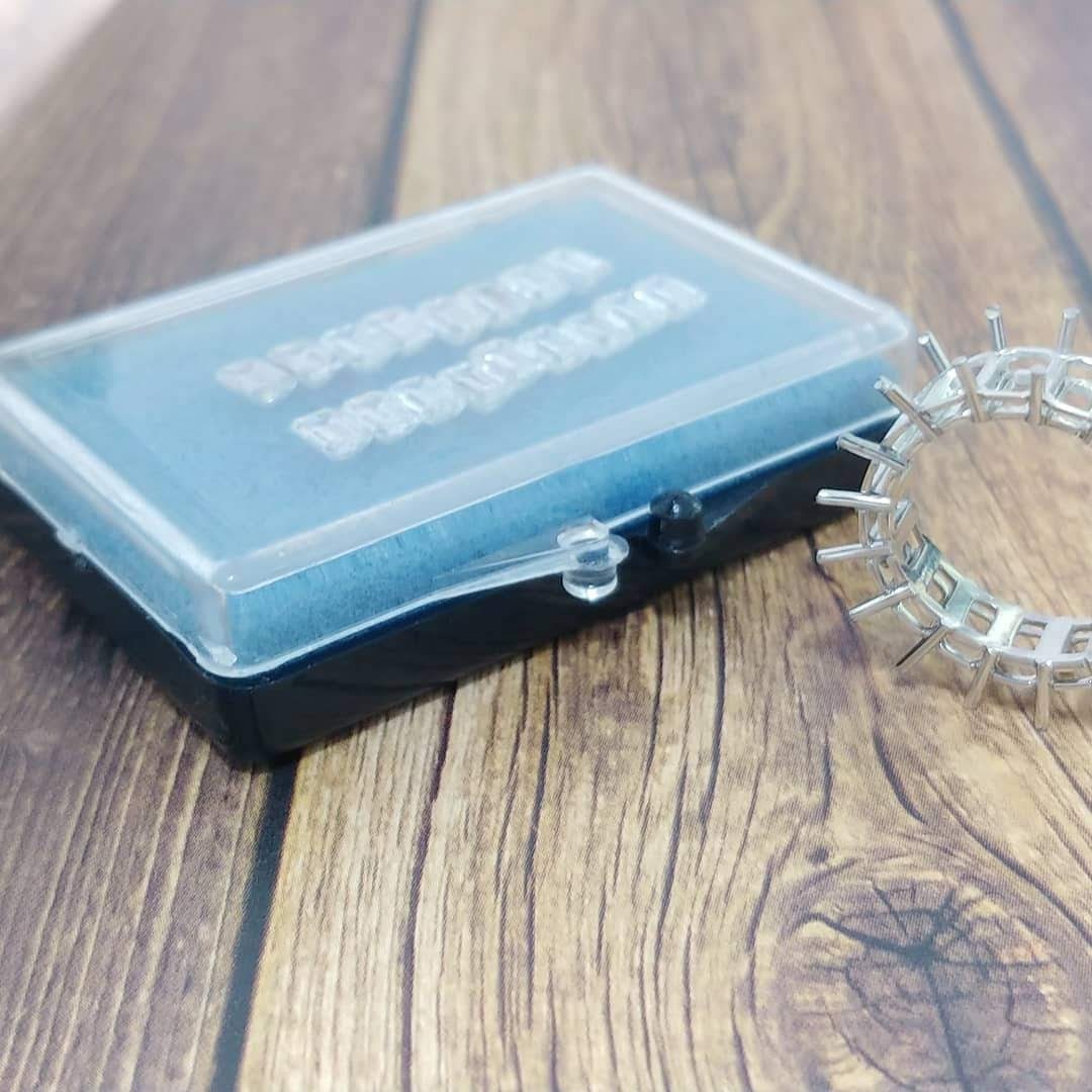 Platinum eternity band with emerald cut diamonds