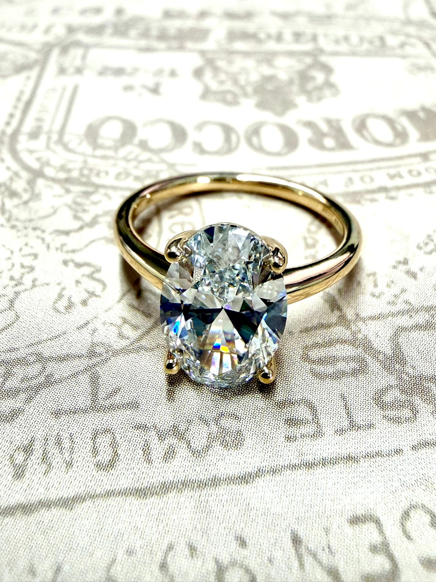 Yellow gold oval diamond engagement ring 2ct