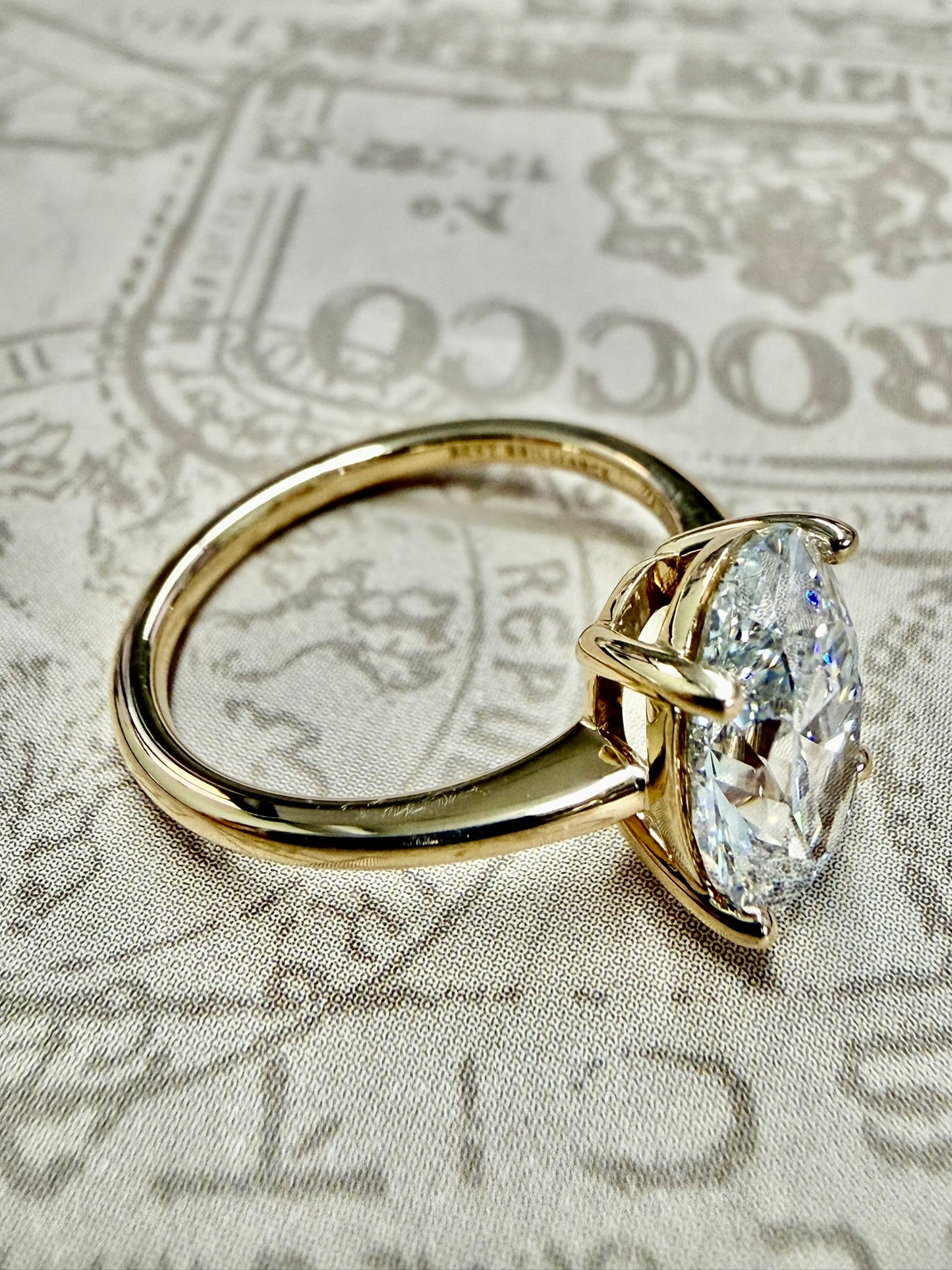 Yellow gold oval diamond engagement ring 2ct
