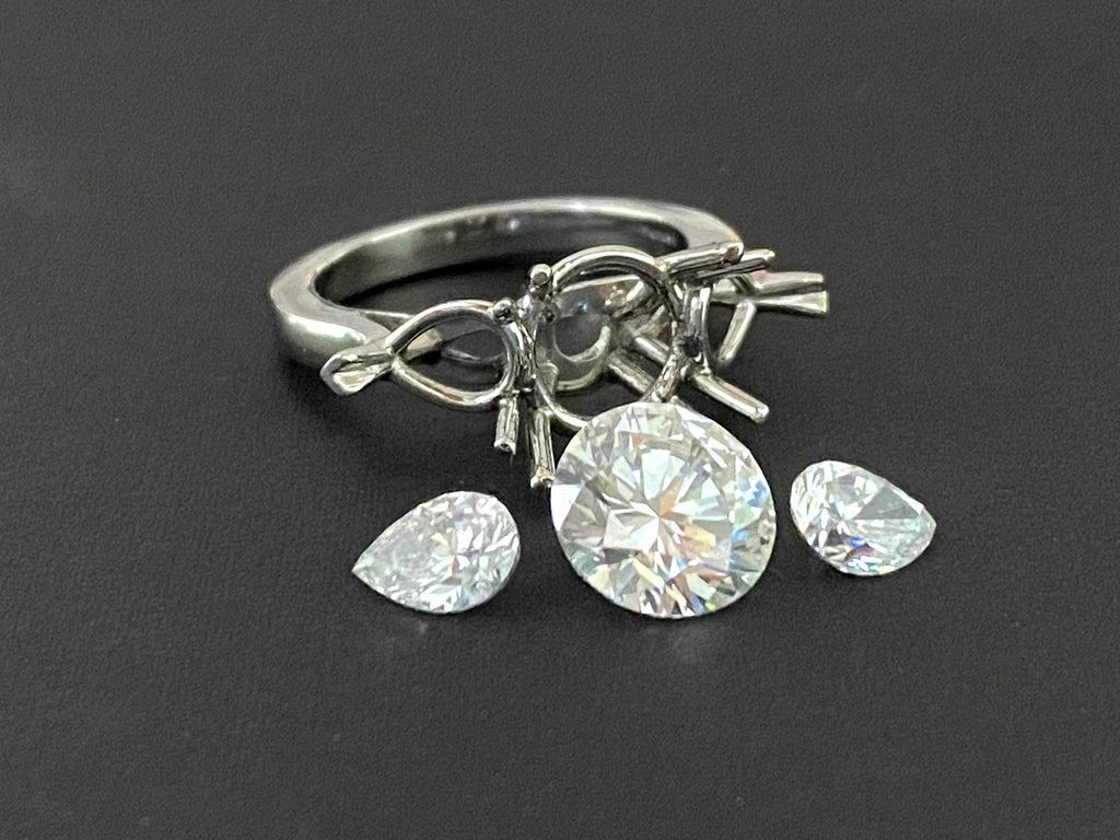 Round diamond center platinum engagement ring