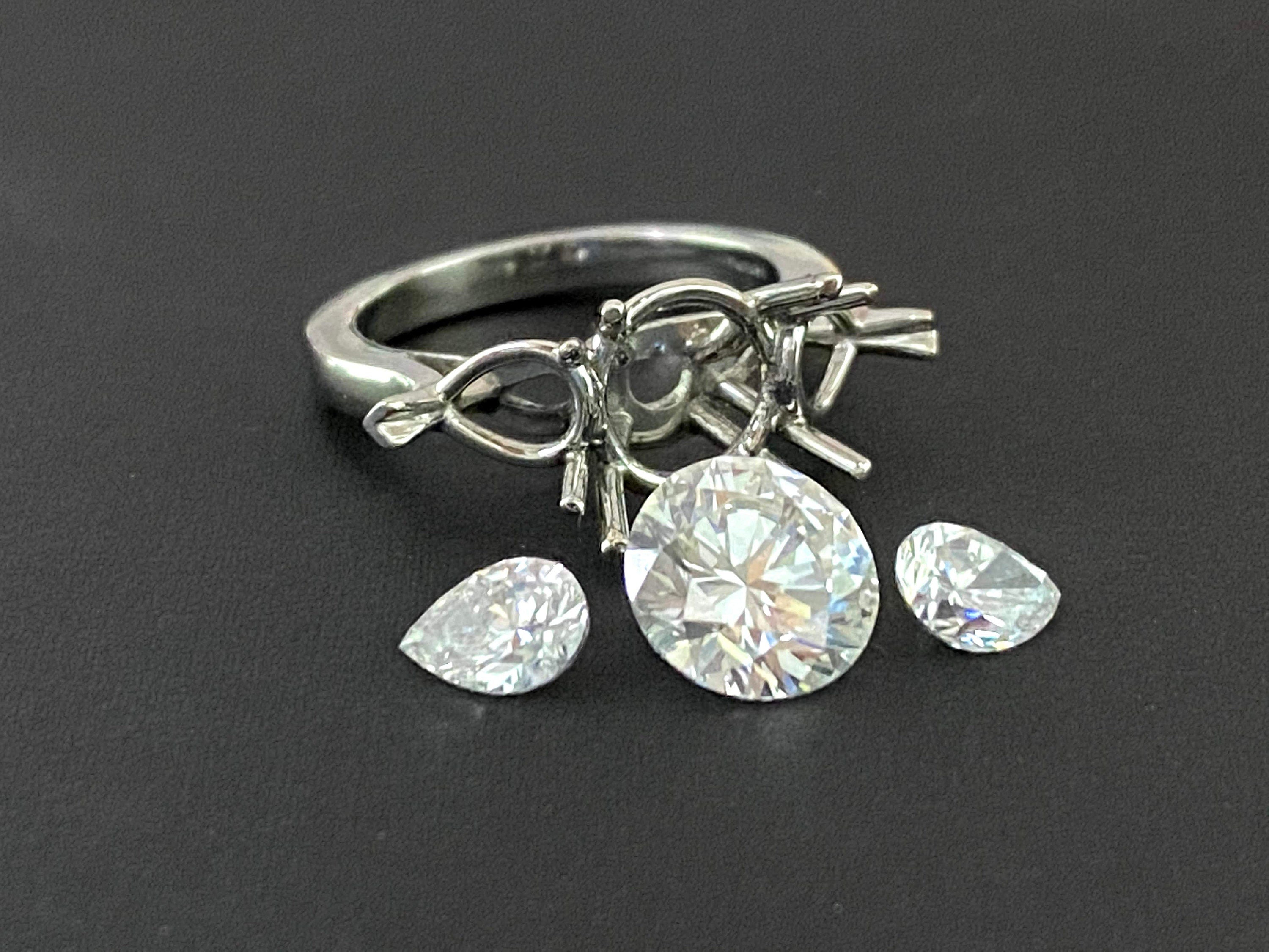 Round diamond center platinum engagement ring