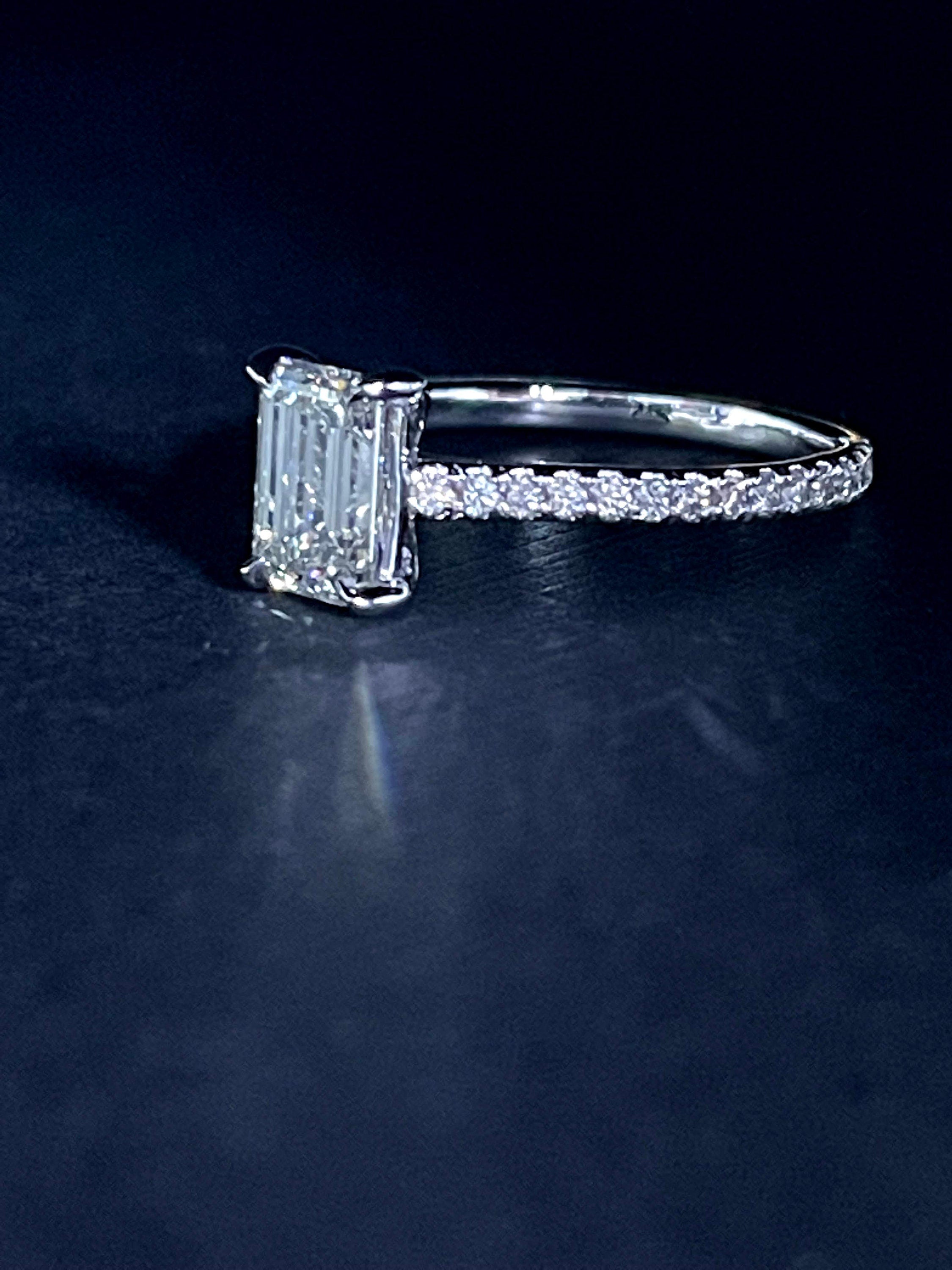 18K white gold emerald cut center diamond ring