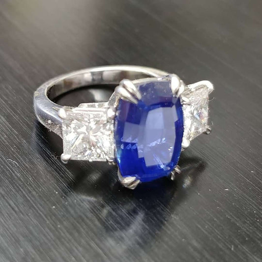 Platinum handmade ring, Cushion sapphire center with princess diamonds